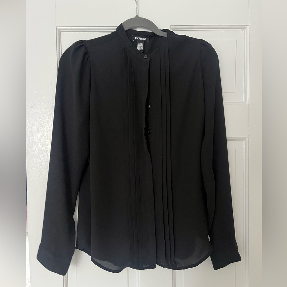Express black chiffon blouse with buttons down the front.
Worn once. Size M.